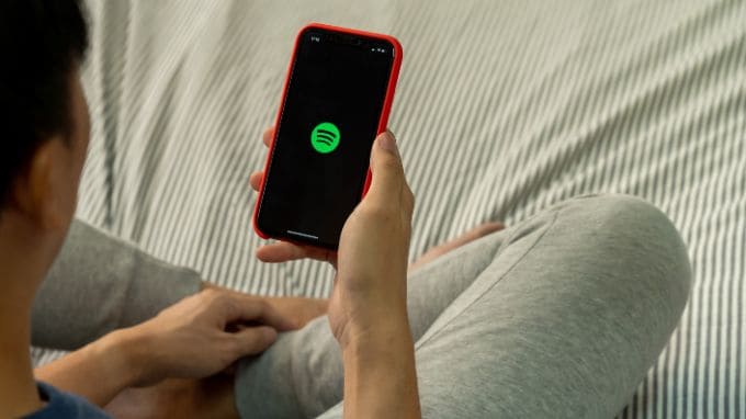 how to get paid to listen to music on Spotify